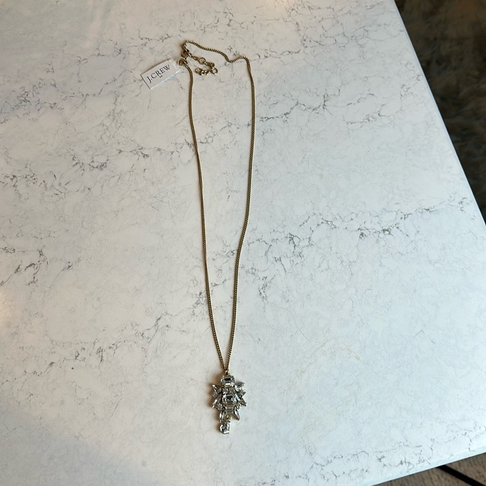 J Crew long gold tone with crystal stone medallion costume necklace. NWT